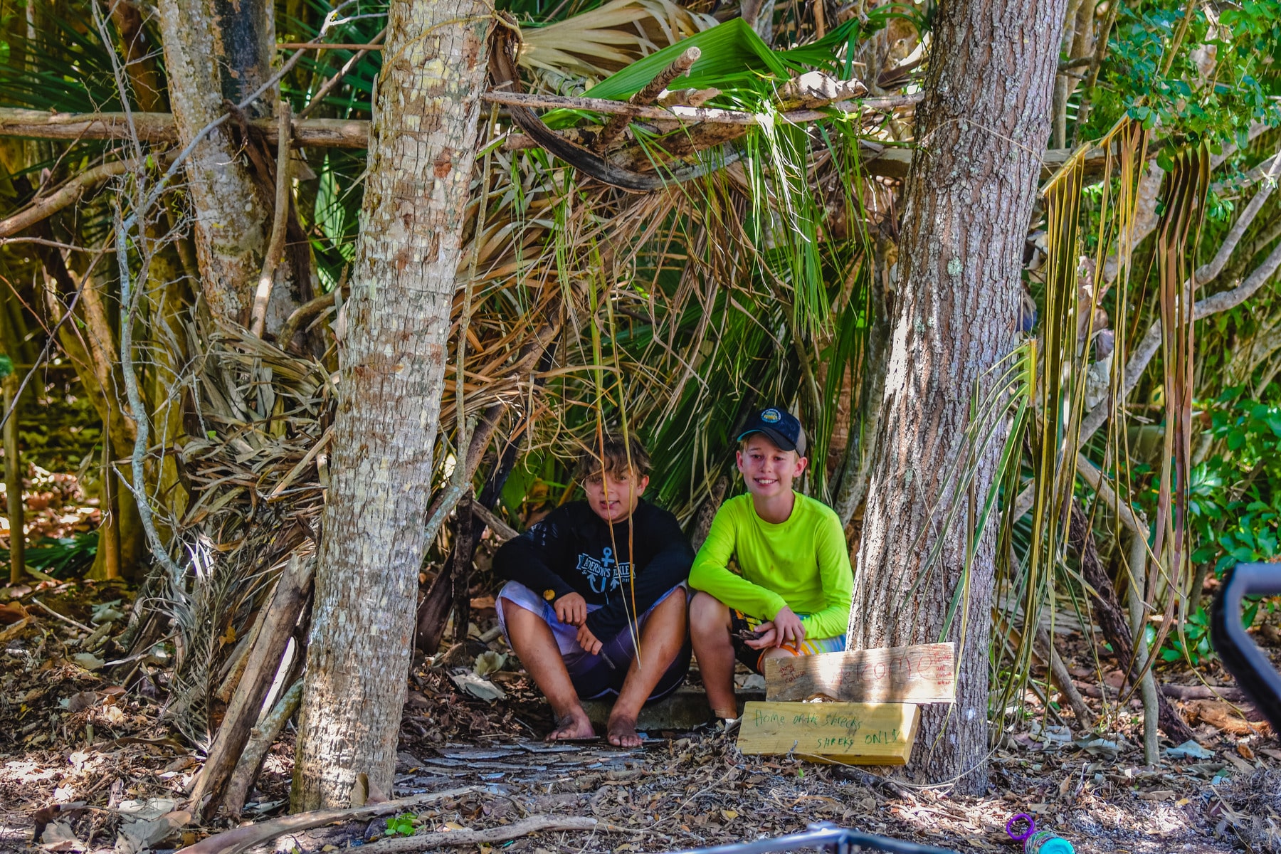 Sanibel Sea School campers in shelter built with palm fronds