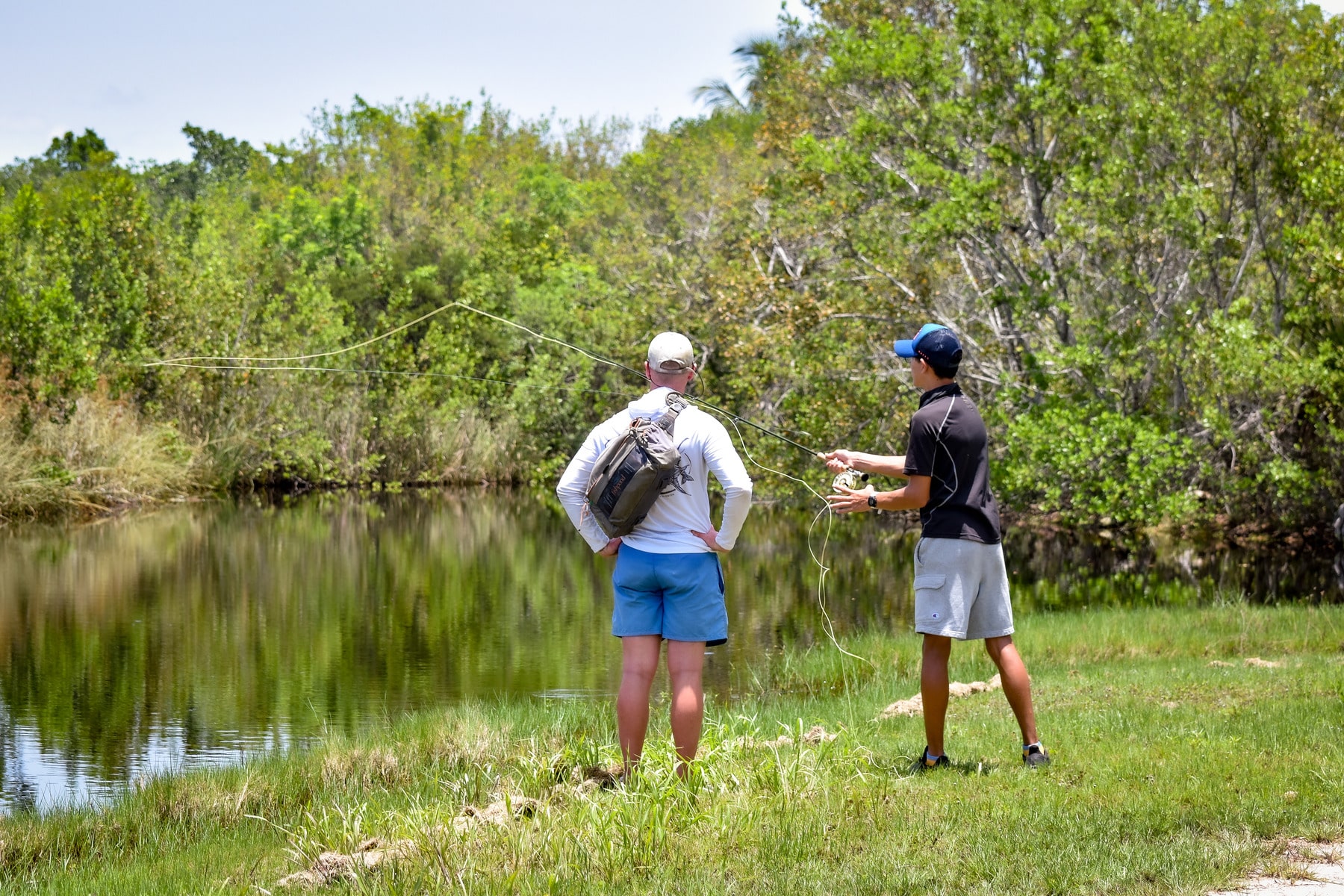 Teen learning to fly fish on Sanibel