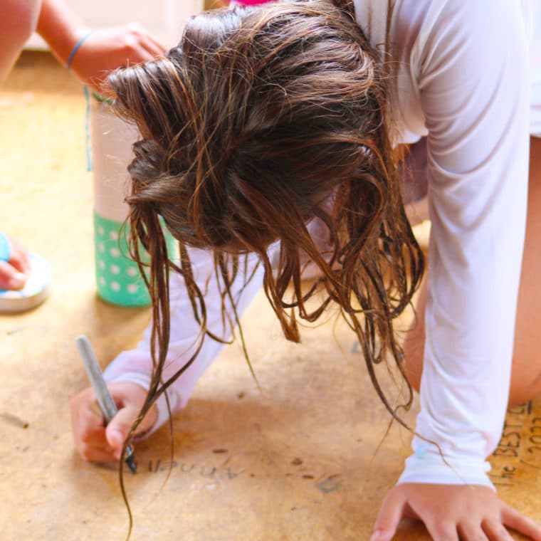 kid signing floor